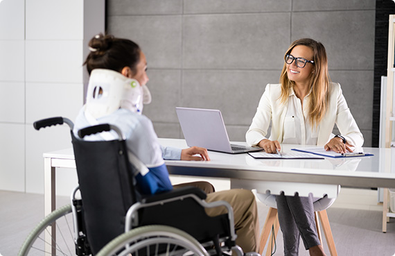 Lawyer assisting a retiring employee with disability claim paperwork - California Disability Law Office