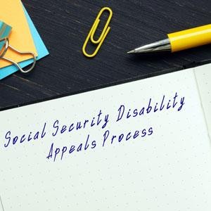 Lawyer guiding clients through the Social Security application process.  