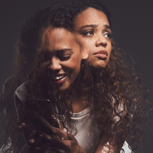 A split-image portrait of a woman representing the duality of bipolar disorder.