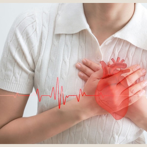 Illustration of a human heart with an anatomical overlay on a person's chest.